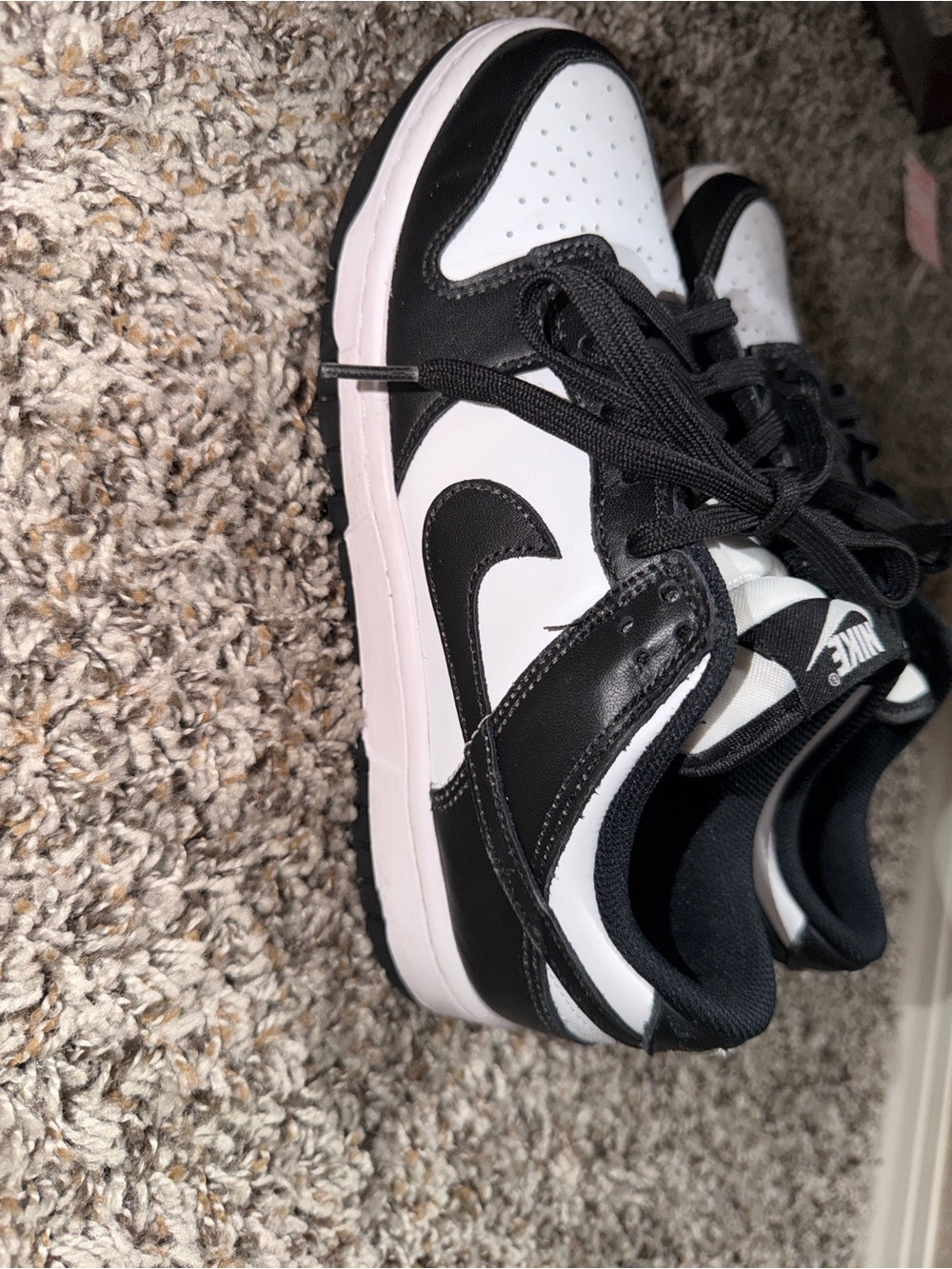 Nike Women’s Black and White Low-Top Sneakers with Pink Midsole Accent
